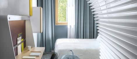 Premium bedding, down comforters, in-room safe, desk