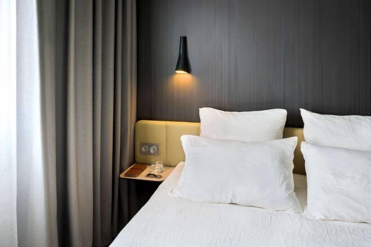 Premium bedding, down duvets, in-room safe, desk