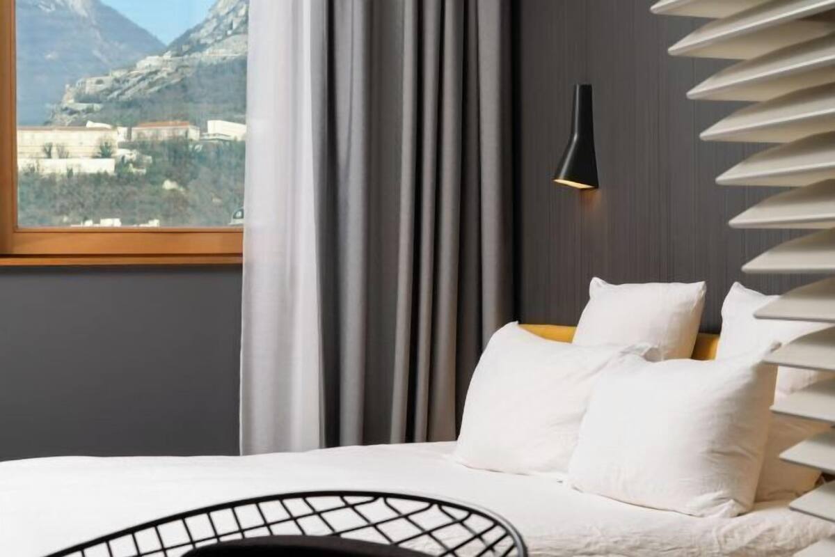 Premium bedding, down duvets, in-room safe, desk