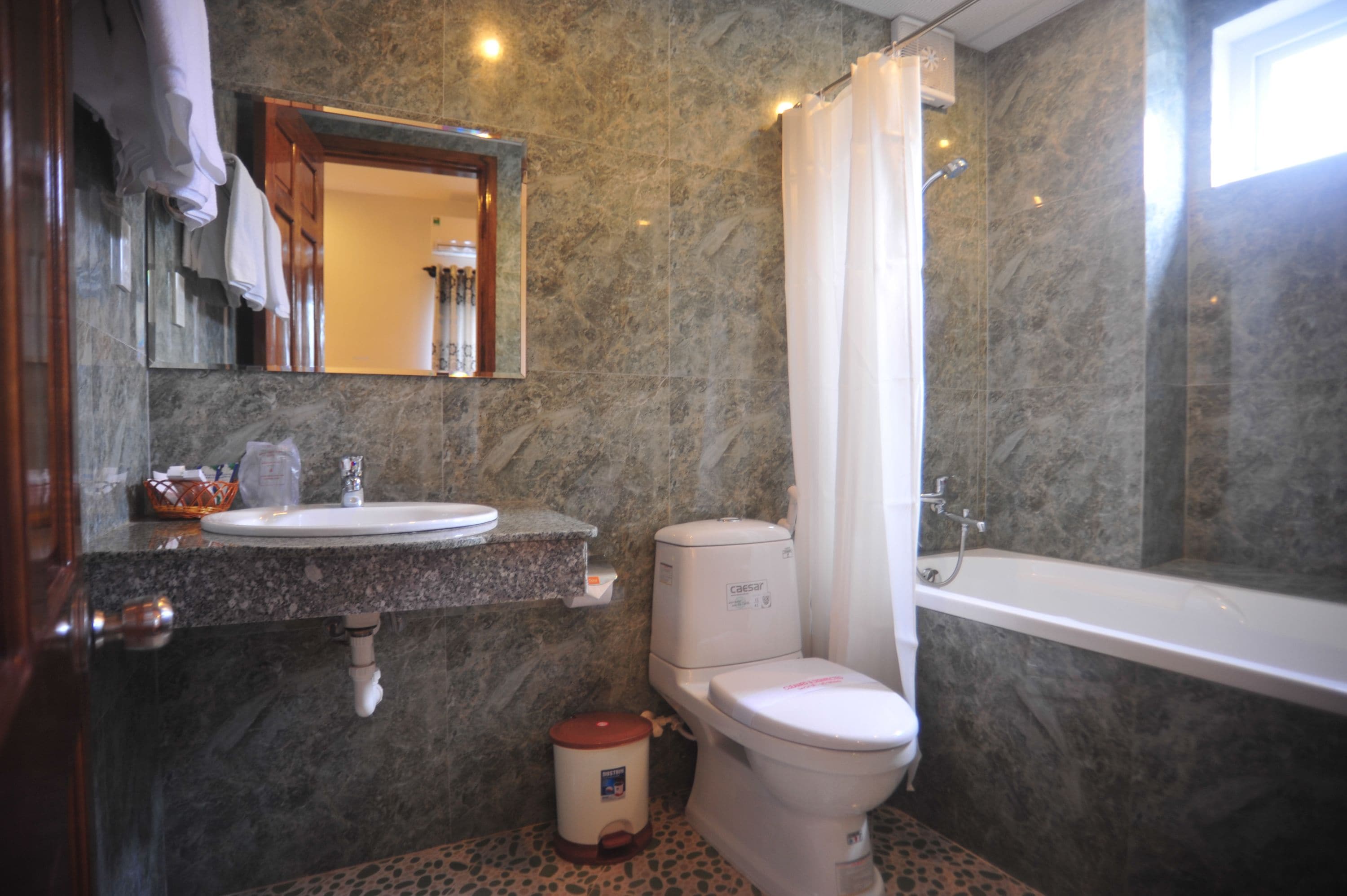 rainfall showerhead, free toiletries, hair dryer, slippers