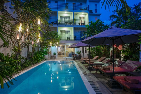 Outdoor pool, pool umbrellas, pool loungers