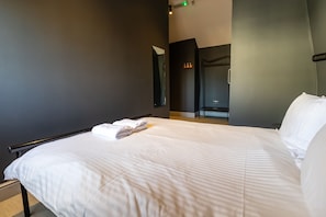 Blackout curtains, iron/ironing board, free WiFi, bed sheets