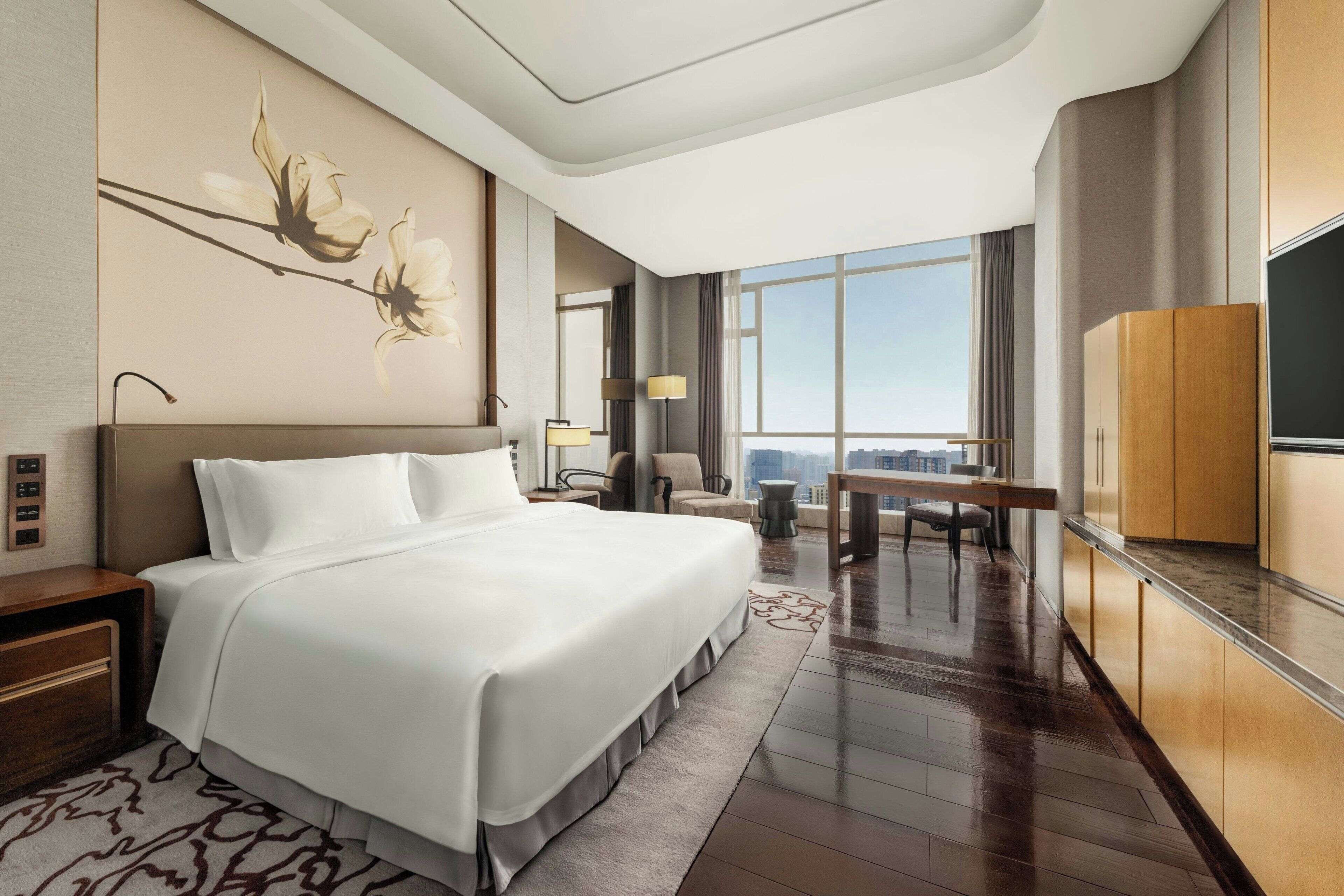 Executive-huone, 1 suuri parisänky, tupakointi sallittu | 1 makuuhuone, untuvapeitot, minibaari, tallelokero huoneessa