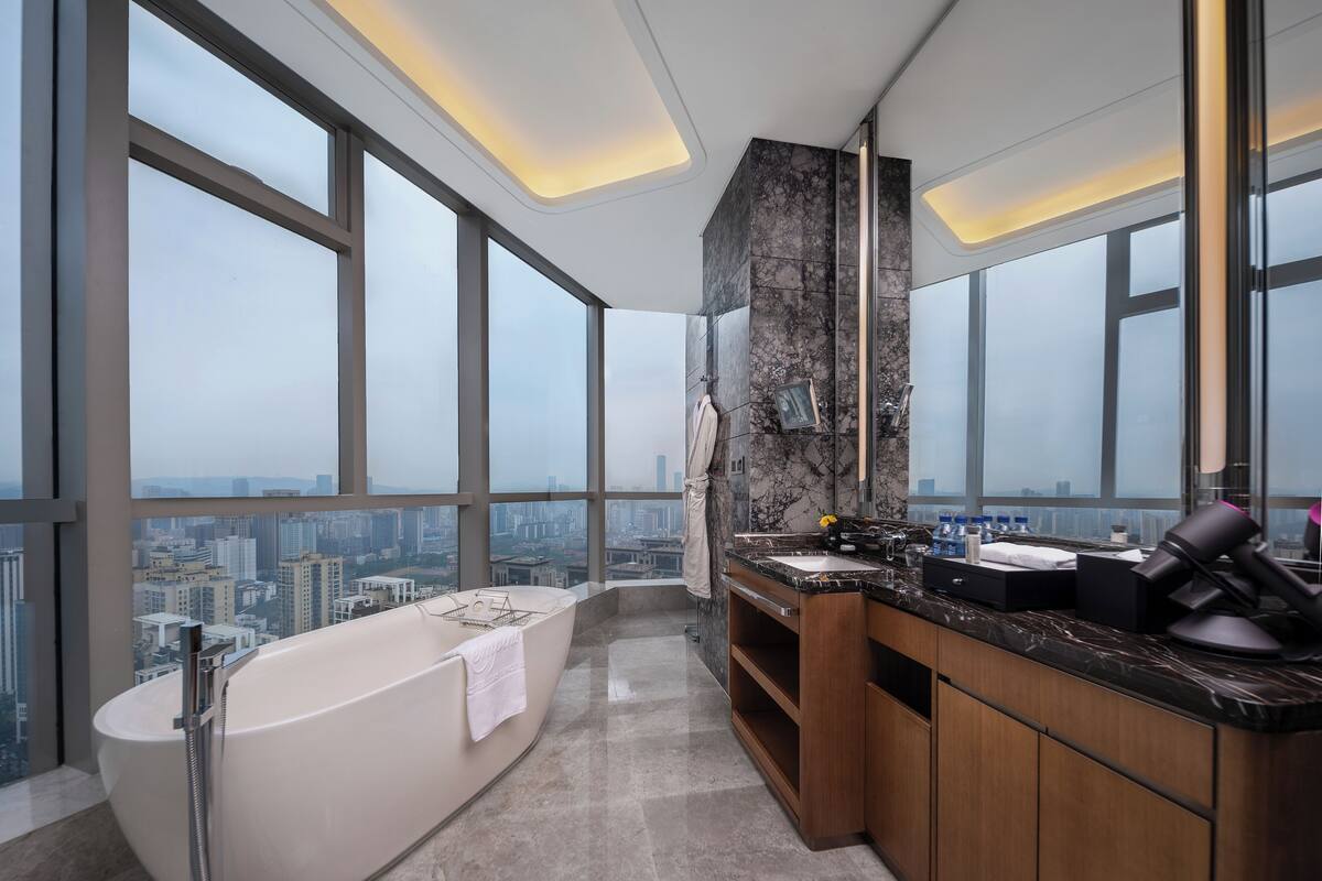 suite, 1 king bed, city view (grand deluxe suite) | bathroom | separate bathtub and shower, deep-soaking bathtub, rainfall showerhead