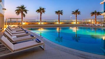 Outdoor pool, sun loungers