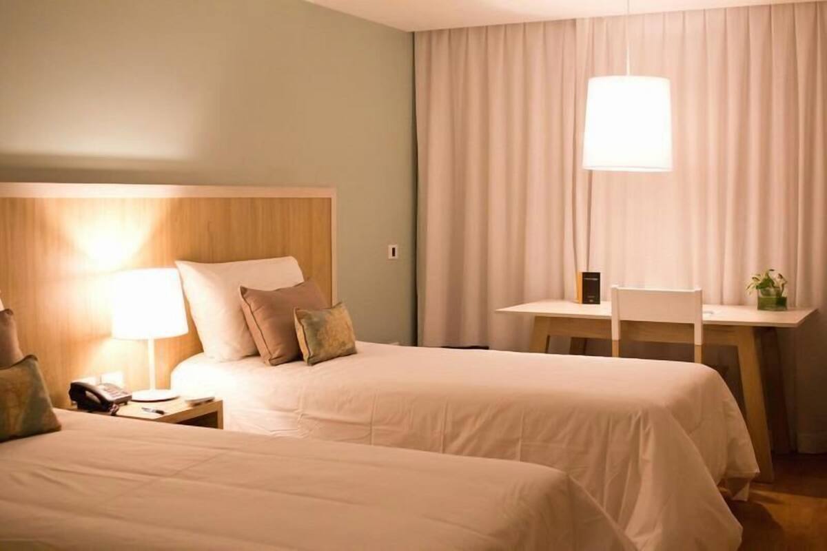 1 quarto, roupas de cama premium, edredons de pluma, frigobar