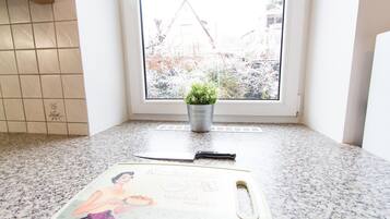 Family Apartment, 2 Bedrooms | Private kitchen | Fridge, microwave, stovetop, dishwasher