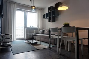 Suite, 1 Bedroom, Balcony | Living area | Flat-screen TV - JTB Nautica Aparthotel (Szczecin)