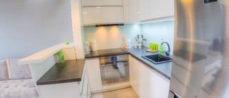 Premium Studio Suite, Balcony | Private kitchenette