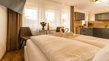 Departamento Deluxe | Caja de seguridad en la habitación, wifi gratis y ropa de cama