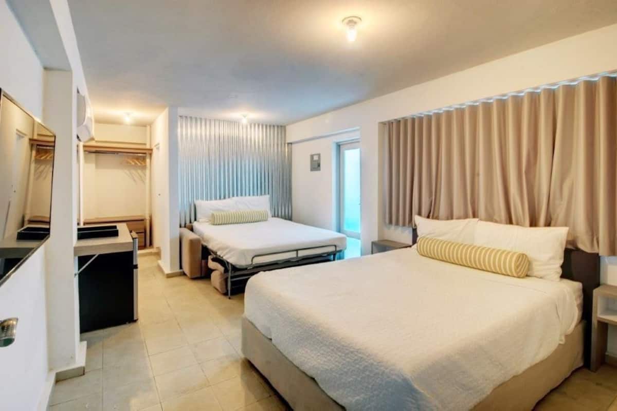 Economy Villa, 2 Queen Beds, Refrigerator & Microwave | Individually decorated, individually furnished, blackout drapes, WiFi