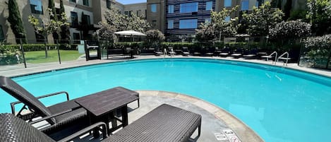 Outdoor pool, open 8 AM to 10 PM, sun loungers