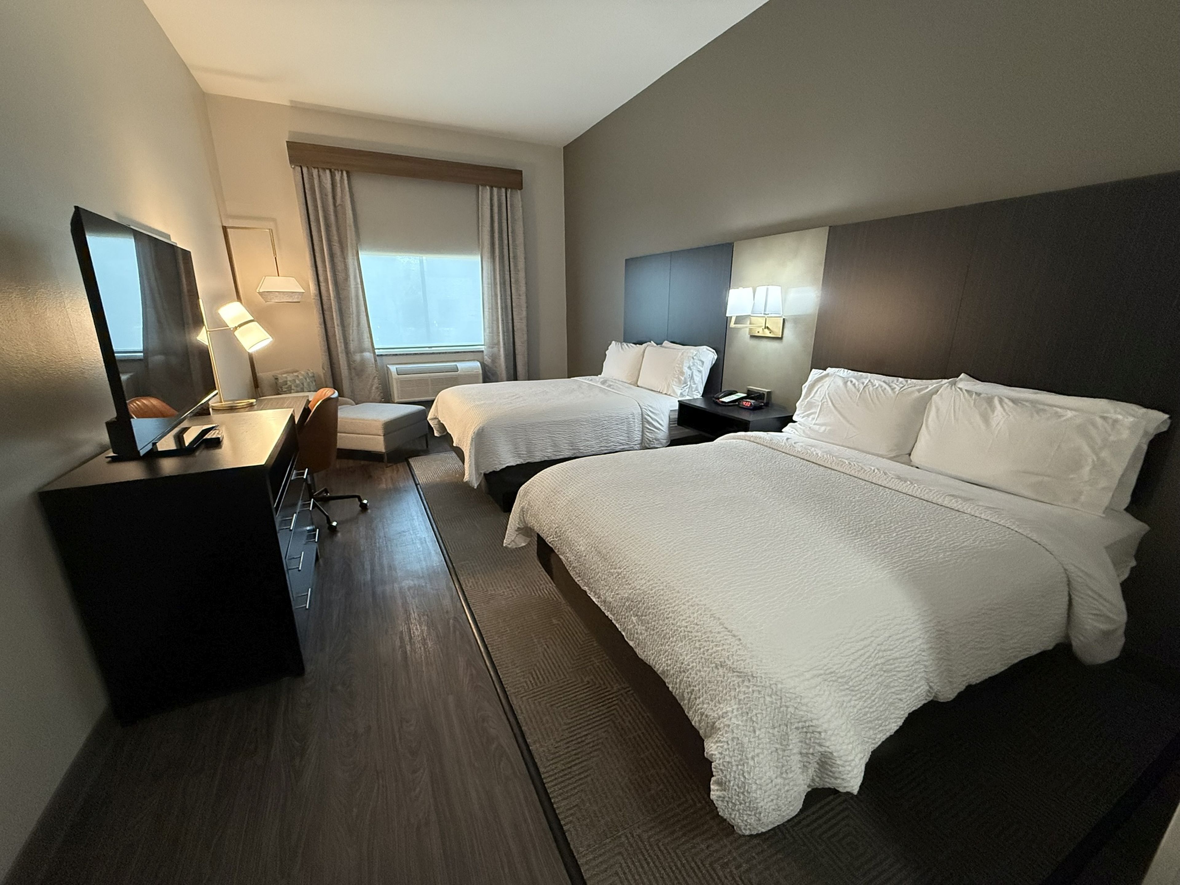 Premium bedding, desk, laptop workspace, iron/ironing board