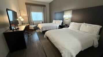 Premium bedding, desk, laptop workspace, iron/ironing board