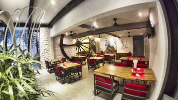 Breakfast, lunch, dinner served; international cuisine