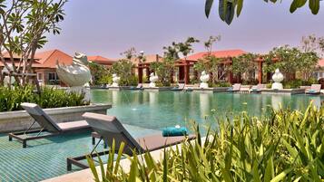 Outdoor pool, free pool cabanas, pool umbrellas