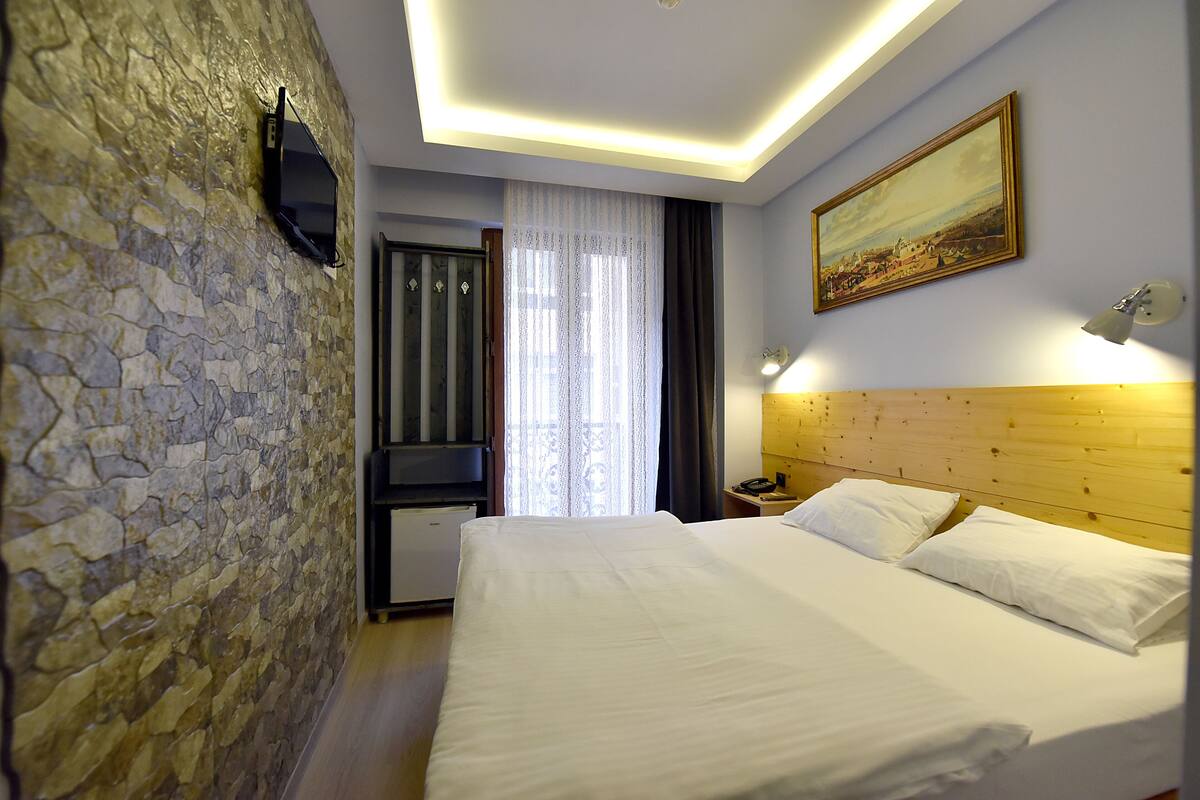 Phòng Economy | Bộ đồ giường cao cấp, minibar, phòng cách âm 