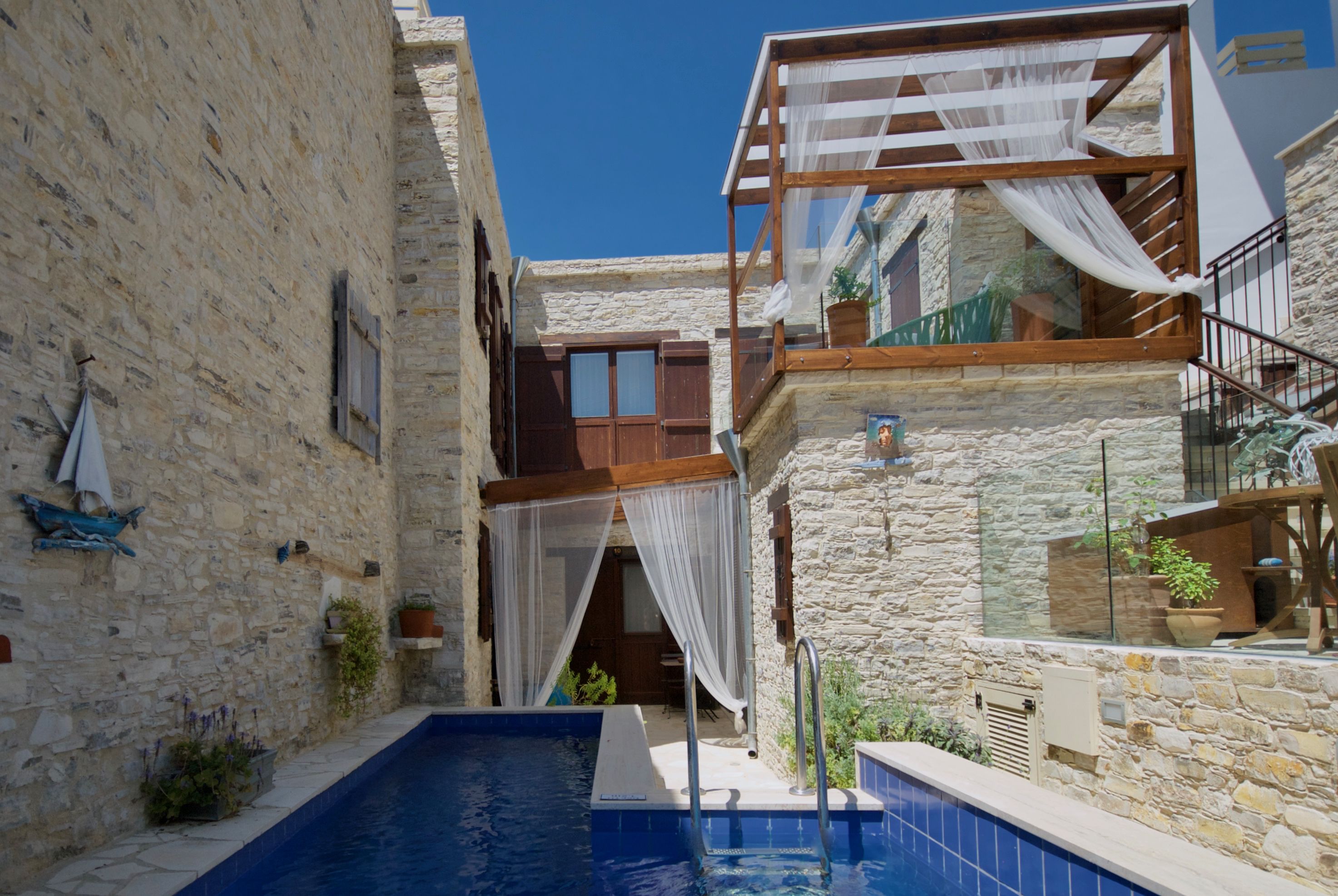 Seasonal outdoor pool, pool loungers