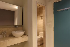 Shower, hair dryer, slippers, towels