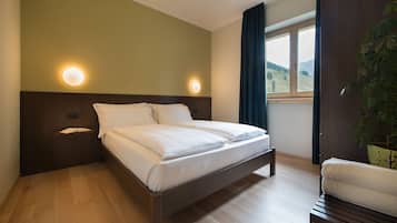 Apartment, 1 Bedroom | 1 bedroom, down duvets, in-room safe, blackout curtains