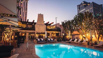 Outdoor pool, open 8:00 AM to 8:00 PM, pool umbrellas, pool loungers