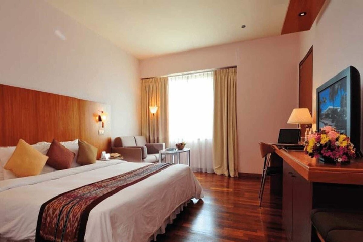 Premium bedding, desk, laptop workspace, iron/ironing board