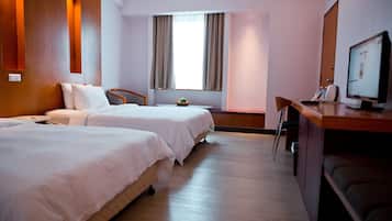 Premium bedding, desk, laptop workspace, iron/ironing board