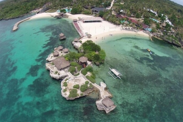On the beach, sun loungers, beach umbrellas, snorkeling