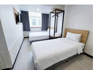 ห้องดีลักซ์ทวิน | ผ้าม่านกันแสง, เตารีด/โต๊ะรีดผ้า, Wi-Fi ฟรี, ผ้าปูที่นอน