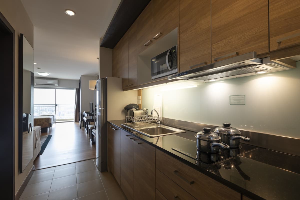 one bedroom suite | private kitchen | full-sized fridge, coffee/tea maker, cookware/dishes/utensils
