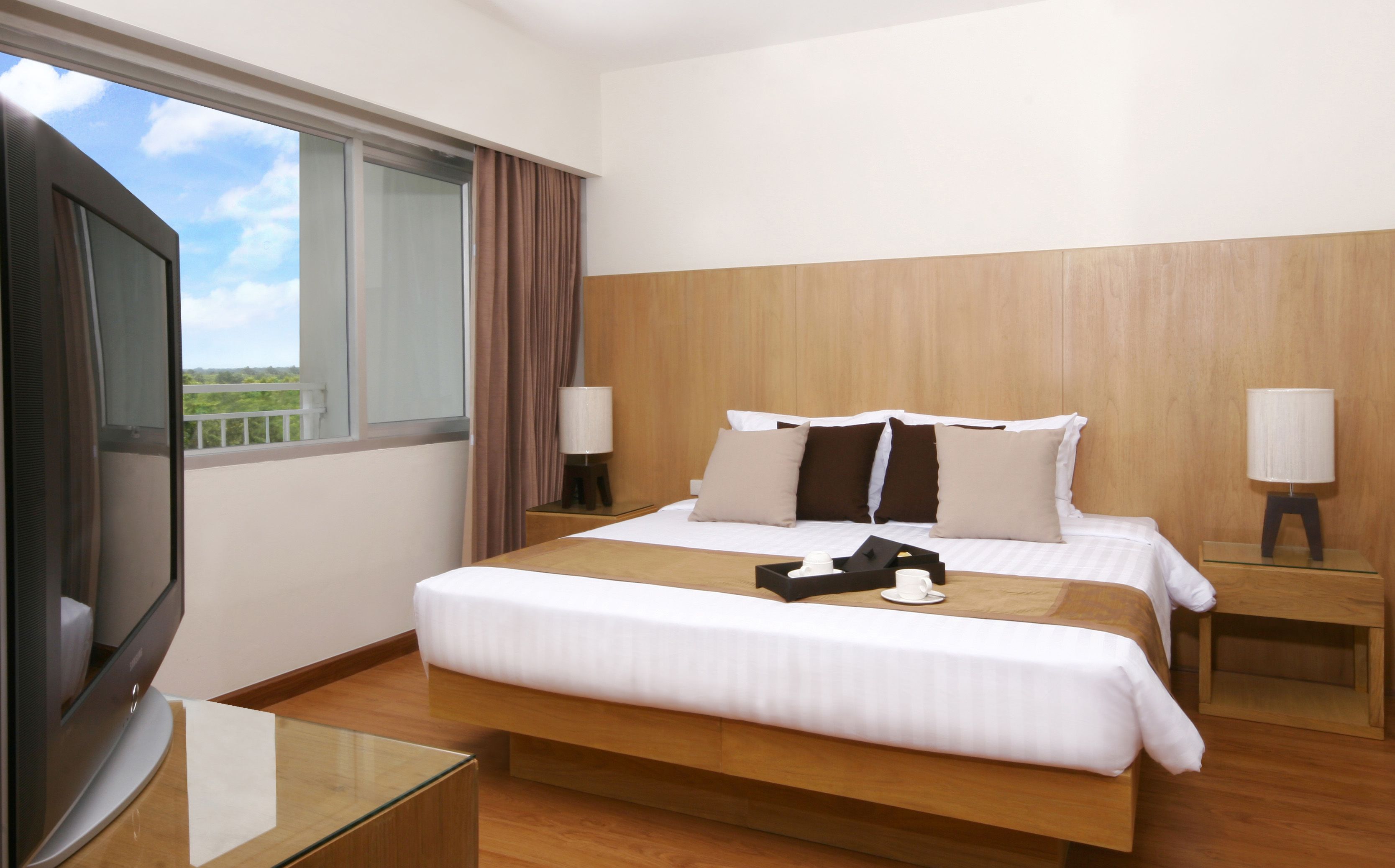 one bedroom suite | premium bedding, minibar, desk, blackout curtains