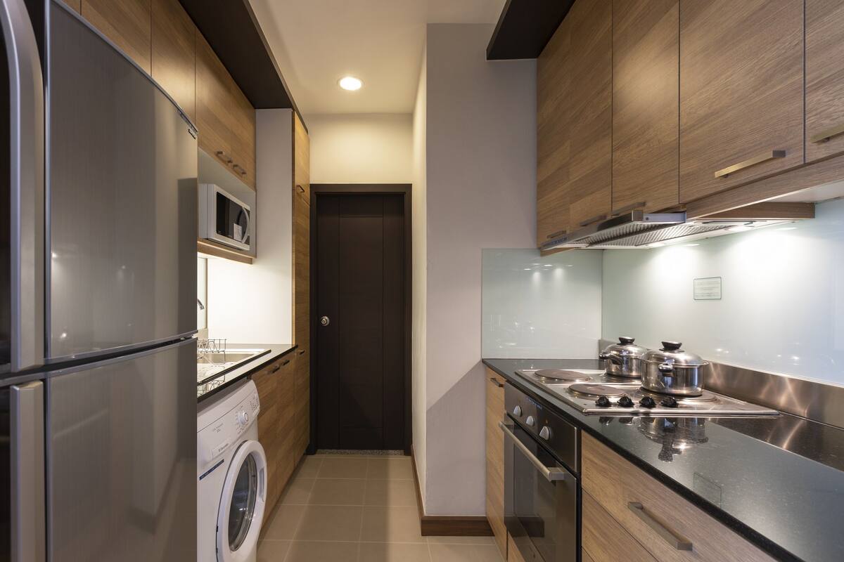 two bedroom suite | private kitchen | full-sized fridge, coffee/tea maker, cookware/dishes/utensils