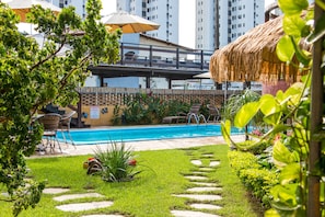 Outdoor pool, open 8 AM to 8 PM, pool umbrellas, pool loungers