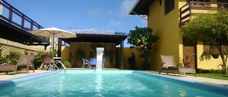 Outdoor pool, open 8 AM to 8 PM, pool umbrellas, pool loungers