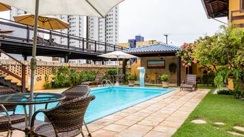 Outdoor pool, open 8 AM to 8 PM, pool umbrellas, sun loungers