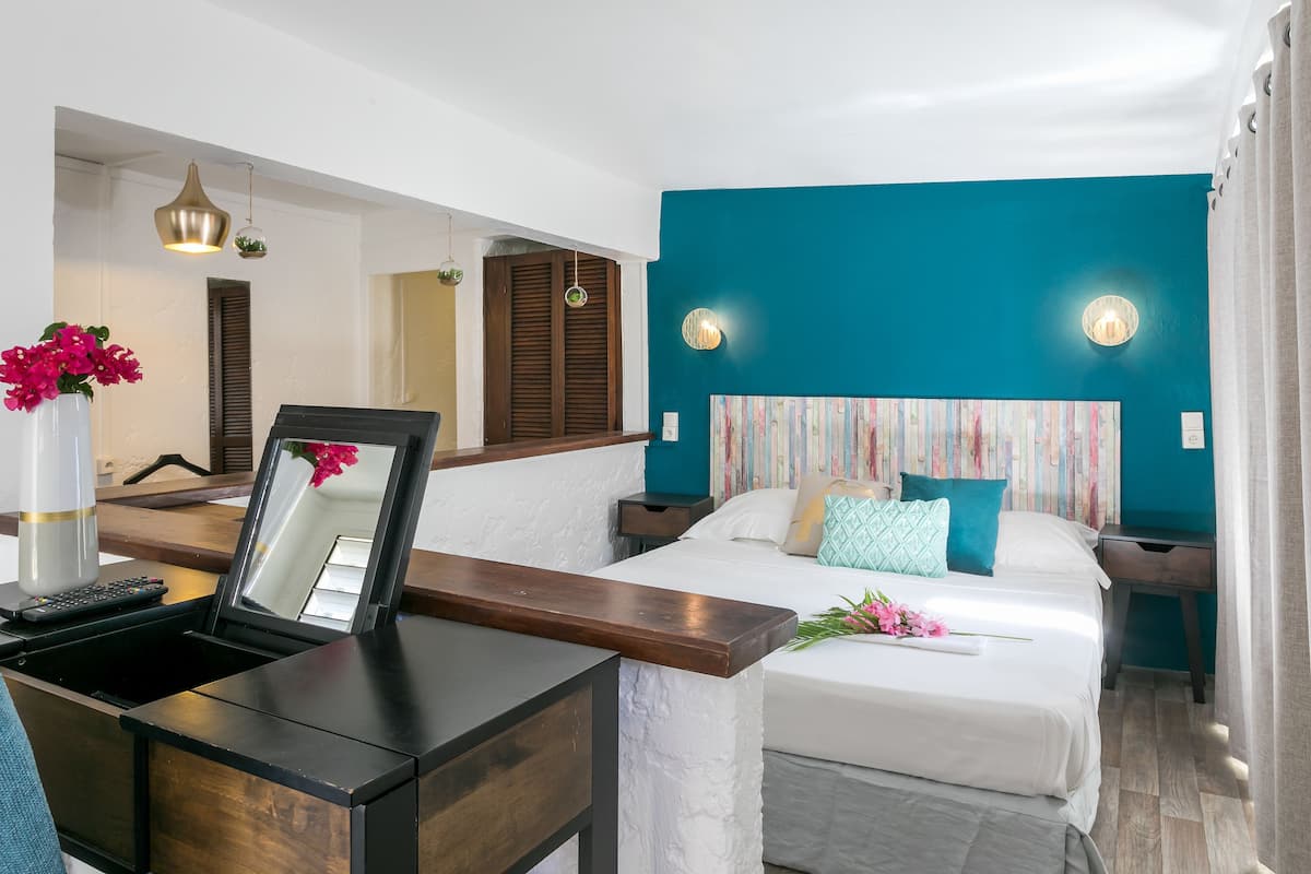 Flamboyant | Een minibar, een kluis op de kamer, een strijkplank/strijkijzer