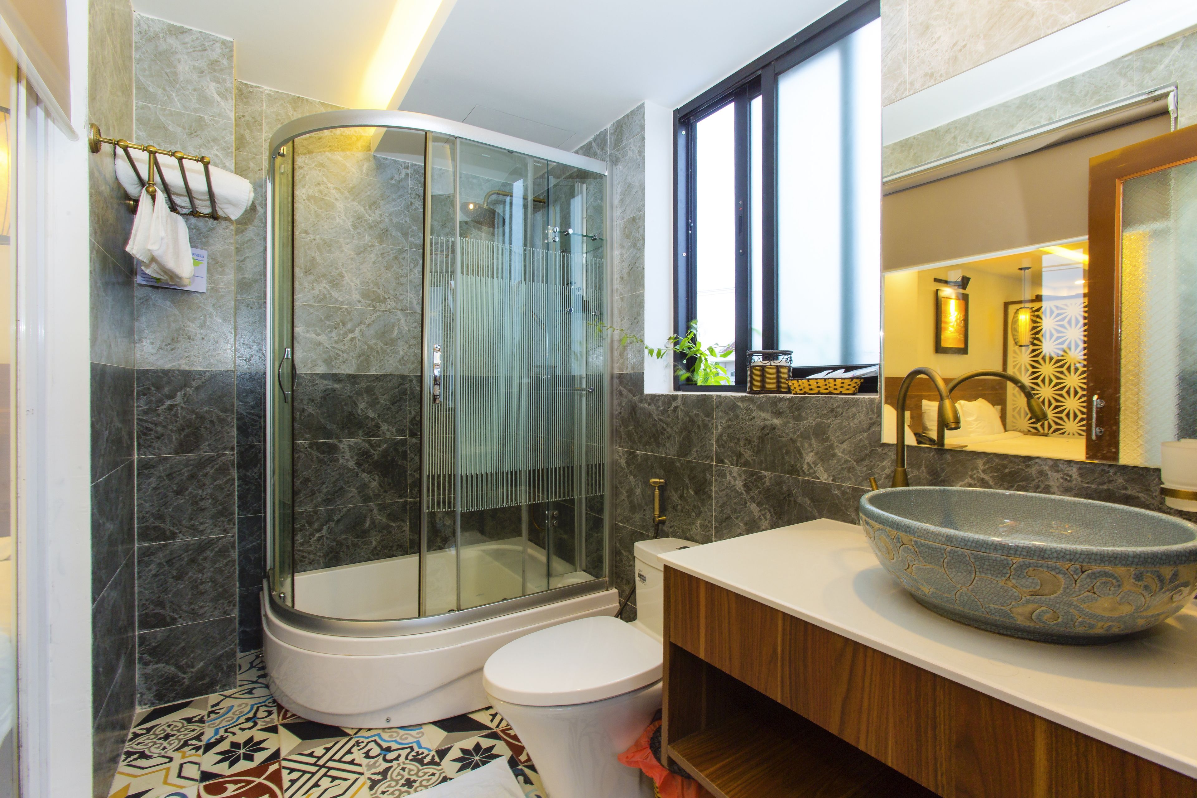 family room, 1 bedroom, garden view | bathroom | shower, rainfall showerhead, free toiletries, hair dryer