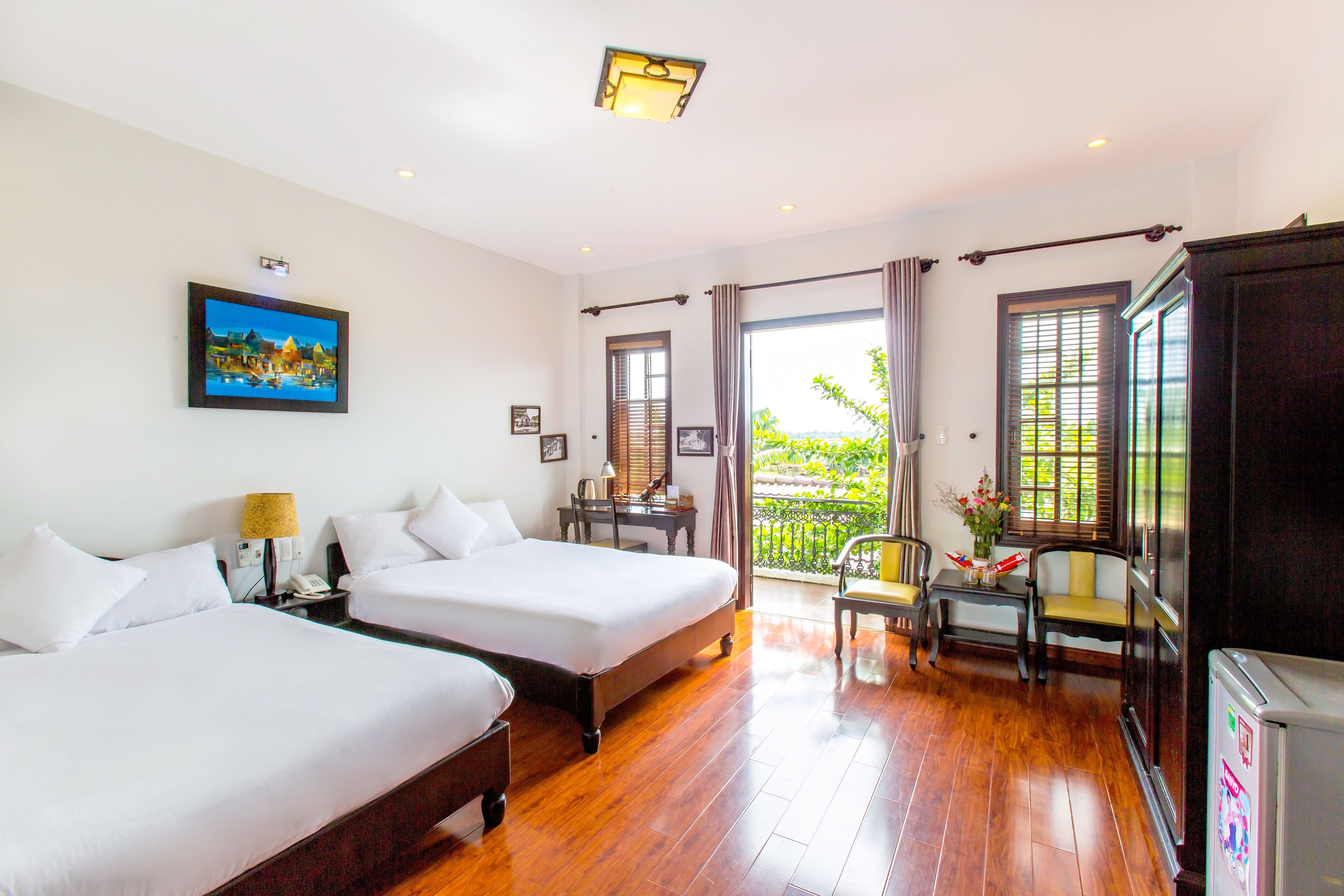 family room, 1 bedroom, river view | living room | 21-inch tv with cable channels