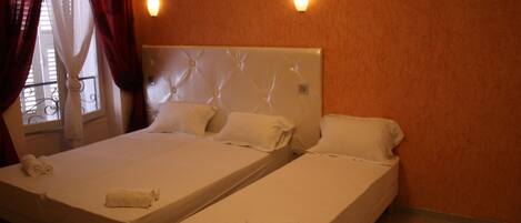 Triple Room | Minibar, in-room safe, soundproofing, free WiFi
