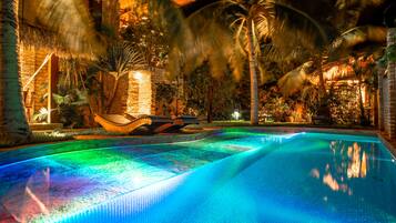 Outdoor pool, open 10:00 AM to 8:00 PM, pool loungers