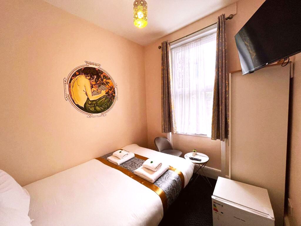 Standaard tweepersoonskamer | Een minibar, individueel gedecoreerd, individueel gemeubileerd