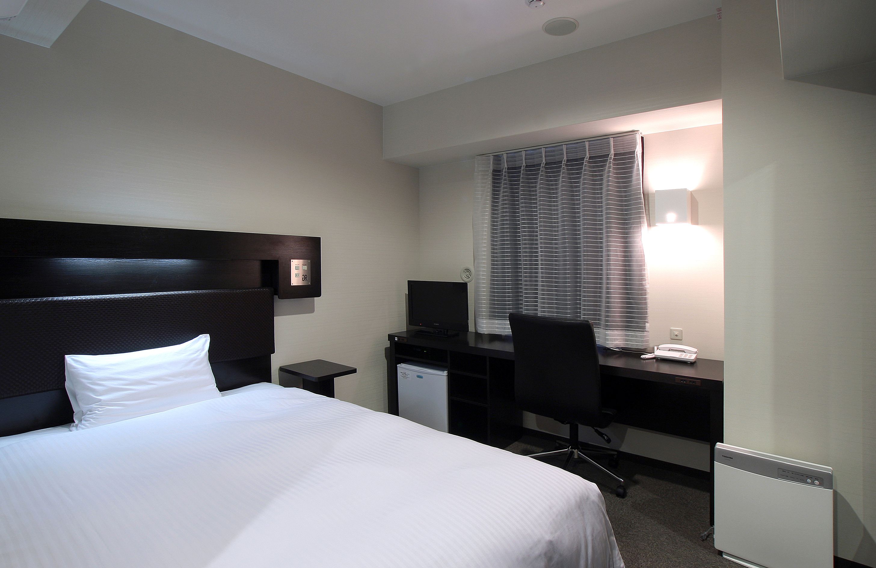 premium bedding, down duvets, desk, blackout curtains