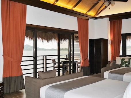 Grand Room | Minibar, bed sheets. Matabungkay Beach Hotel