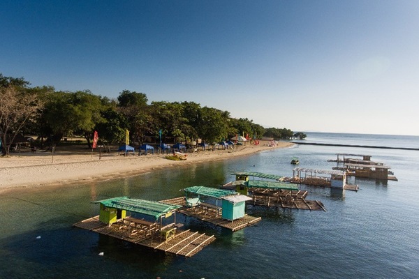 On the beach, sun loungers, beach umbrellas, beach towels