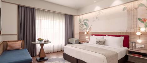 Ylelliset vuodevaatteet, minibaari, tallelokero huoneessa, työpöytä