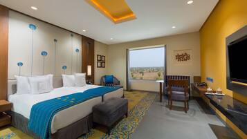 Minibar, coffres-forts dans les chambres, bureau