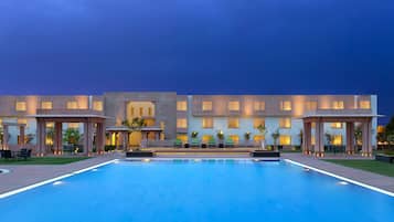 Outdoor pool, open 7:00 AM to 7:00 PM, pool umbrellas, pool loungers