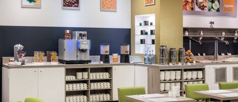 A modern cafe with a coffee station, seating area, and a wall with 'Express Start' signage.