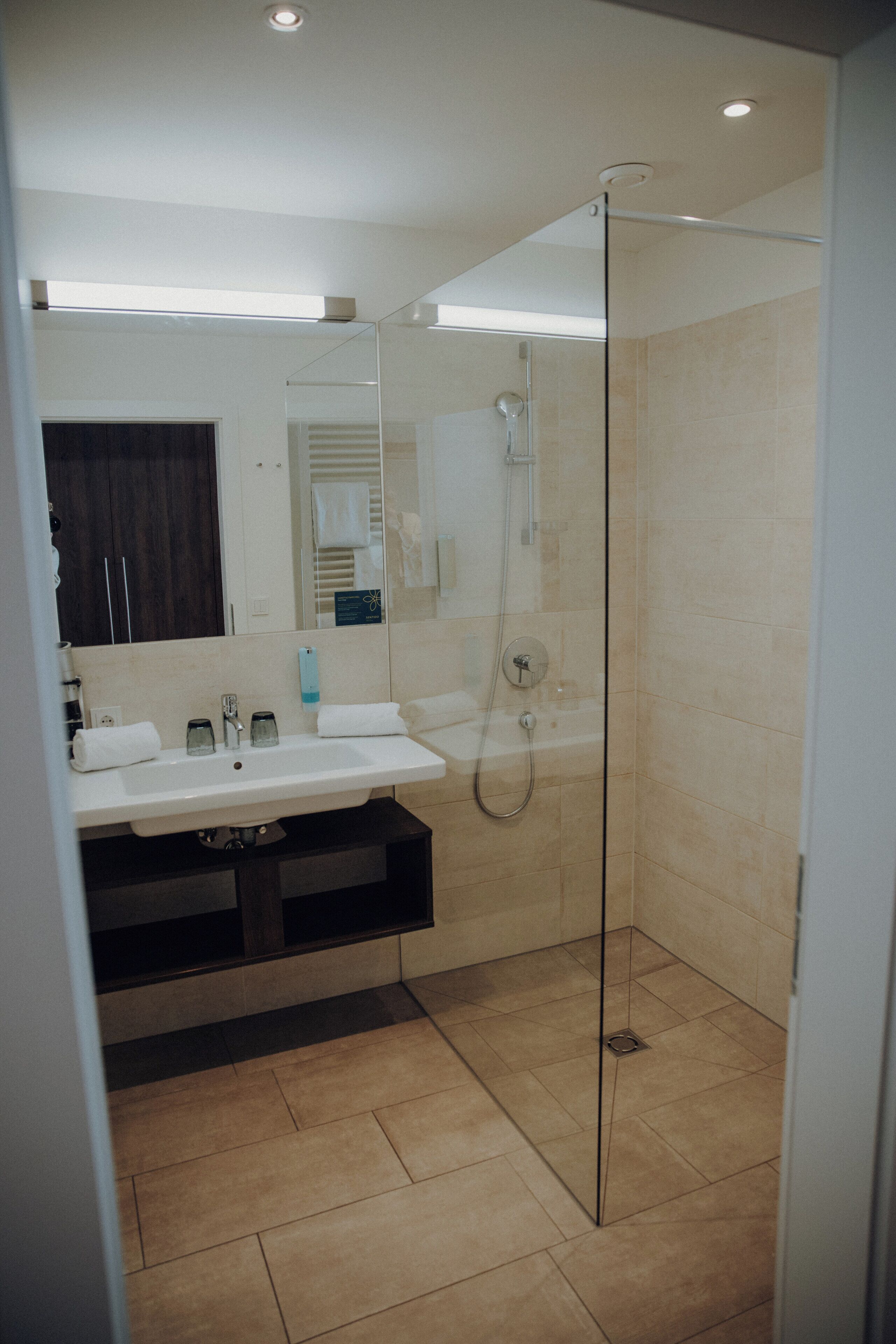 family room, balcony | bathroom | hair dryer, bathrobes, slippers, towels