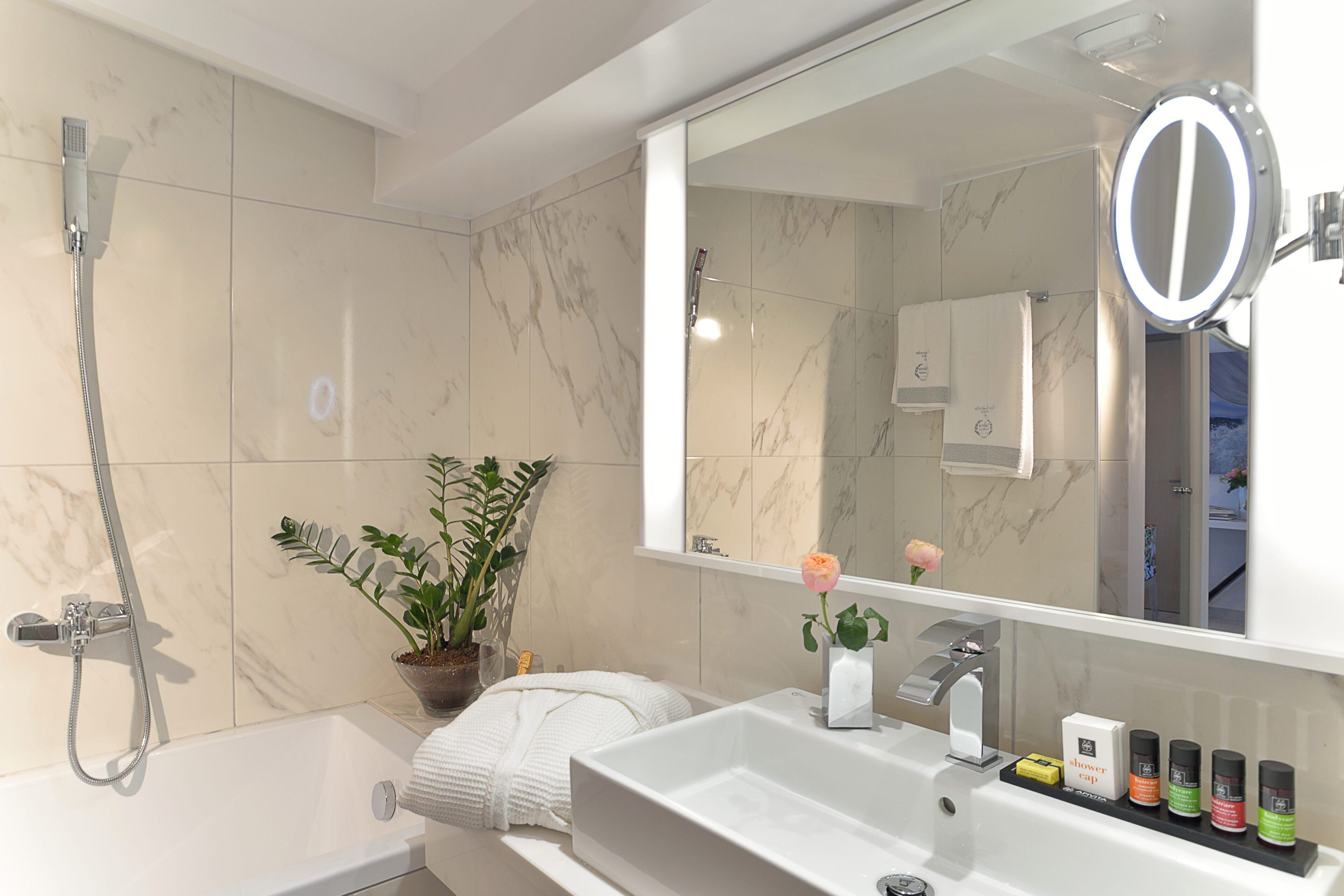 rainfall showerhead, designer toiletries, hair dryer, bathrobes